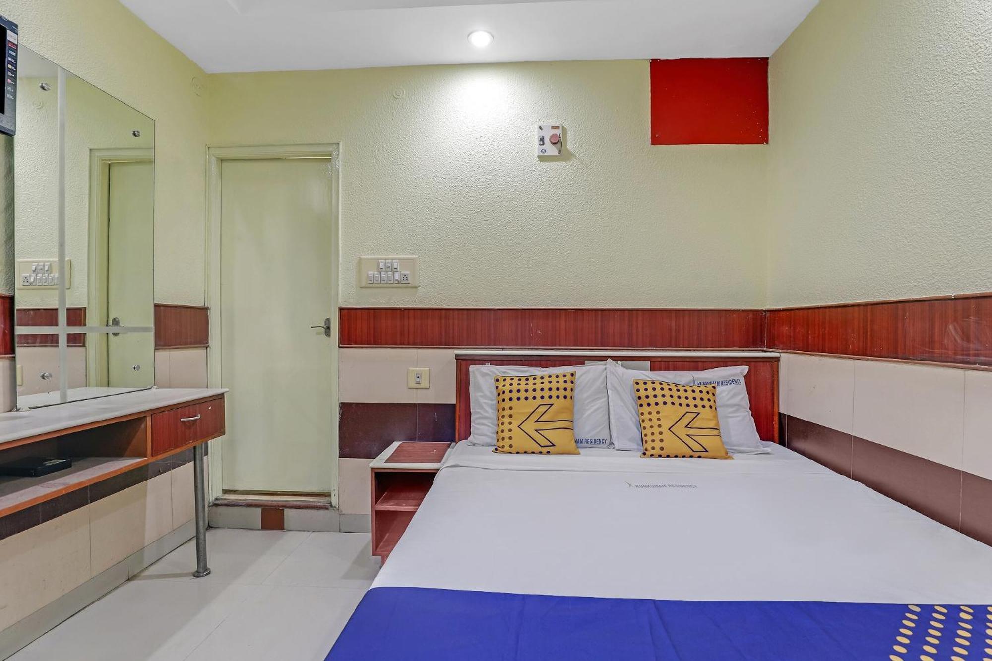 Spot On 77468 Kunkumam Residency Hotel